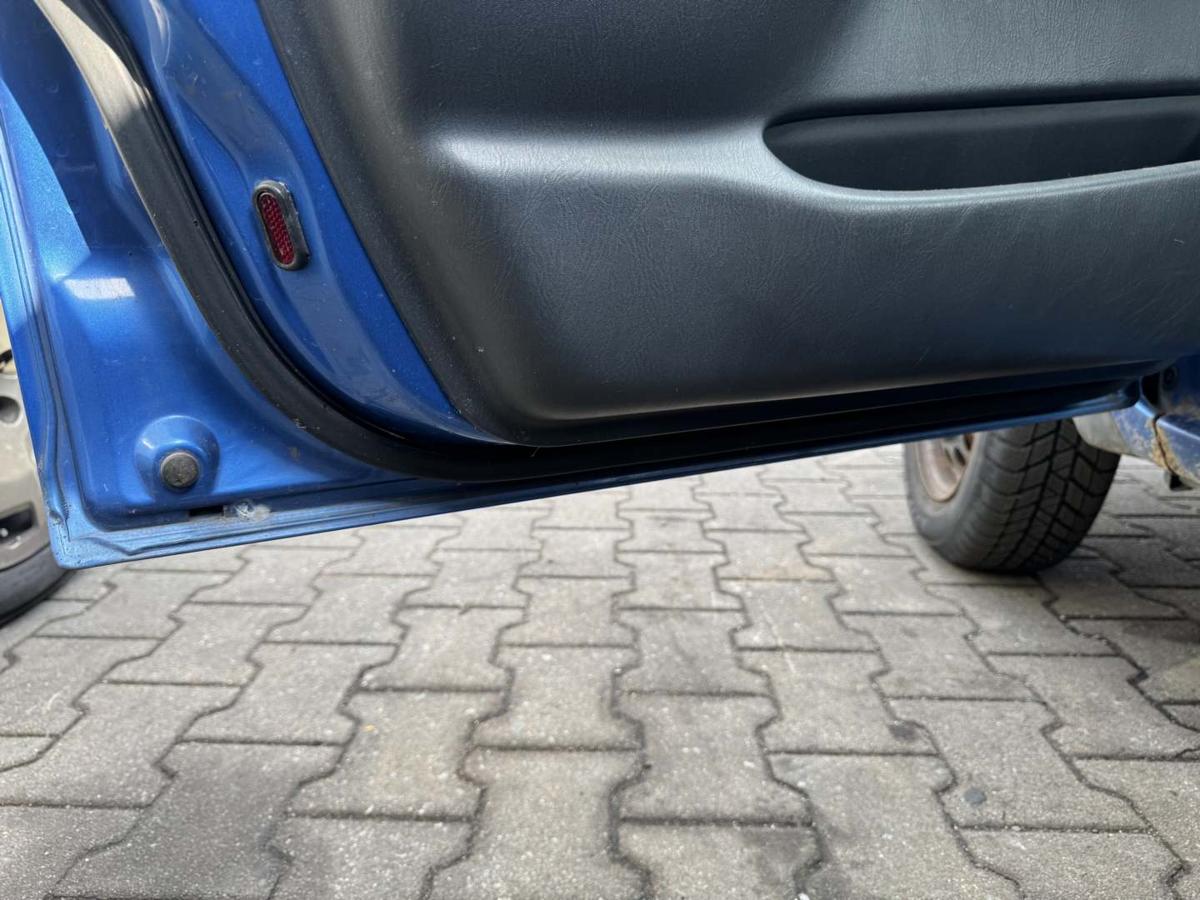 Suzuki Ignis FH original T&uuml;r vorn links Z2J Cyprus Blue 5-T&uuml;rer Rohbau Bj.2003